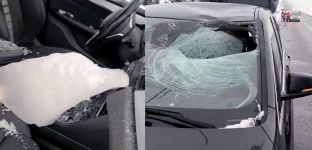 O krok od tragedii. Bryła lodu spadła z ciężarówki i przebiła szybę BMW