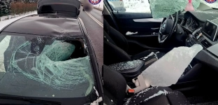 O krok od tragedii. Bryła lodu spadła z ciężarówki i przebiła szybę BMW